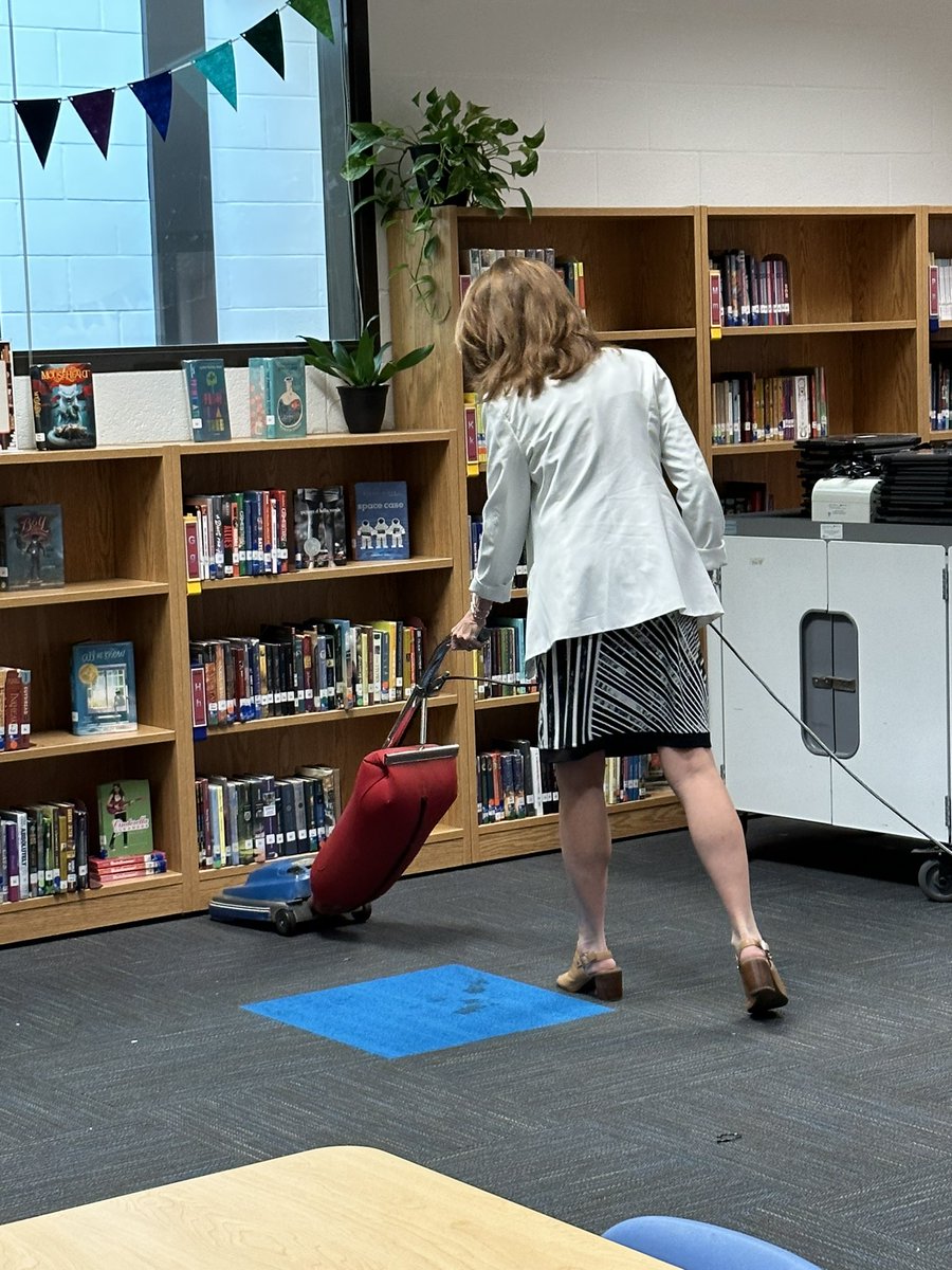 AnnKAnders's tweet photo. The excitement at @EasternWCPS is contagious! @Kelly_Houpt is ready to foster the ❤️ of reading with weeding, reorganization and updates for the new school year. #cleancarpetcounts https://t.co/paAnqBEwe6