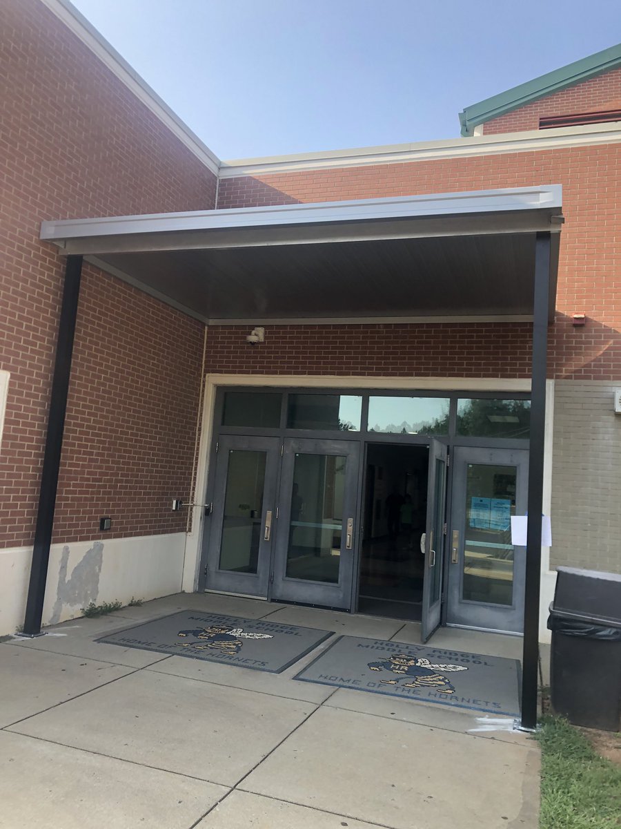hrms_pta's tweet photo. We have a brand new awning at the back entrance of the school! Teachers made this request to PTA, noting that when it rains, students get soaked waiting to be buzzed in. Run for the Ridge proceeds fulfilled this request. 
Thanks to our PTA sponsors &amp; to all who joins and donates! https://t.co/AX4Sezjq8K