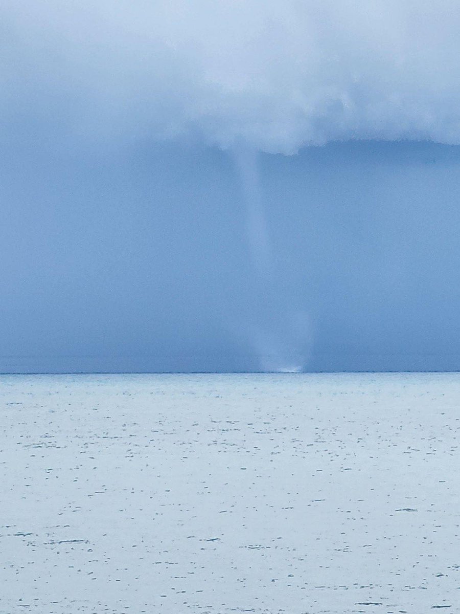 Another one from today (8/24/23)… this time it’s a waterspout. Meaning the circulation that formed the funnel made it to the water. If that circulation moved on land, it’d be considered a tornado. #NLwx 

📸 Brad Mitchell
📍 Green Island Cove, Northern Peninsula
