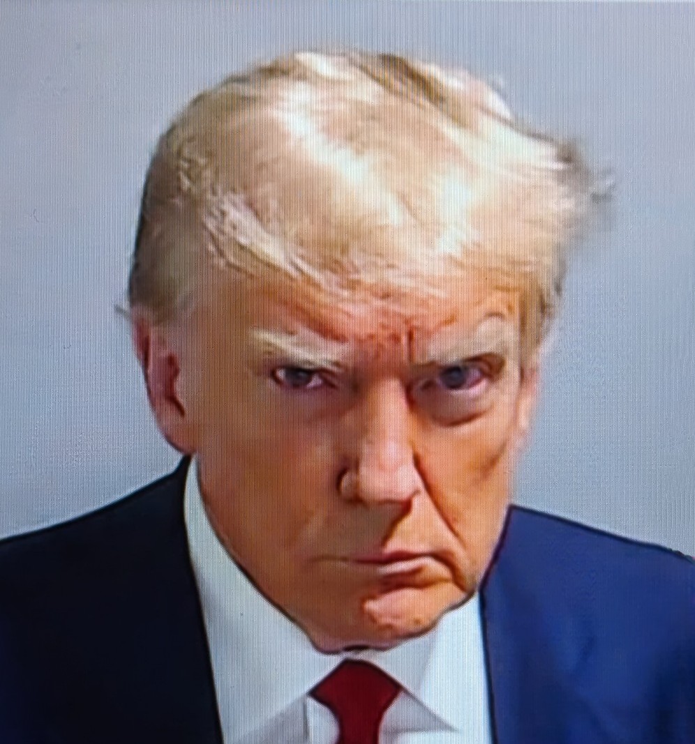 Desert_Bob's tweet photo. POTUS 45 has got his #angryeyes on. #TrumpMugShot https://t.co/GEbCVbZj8F