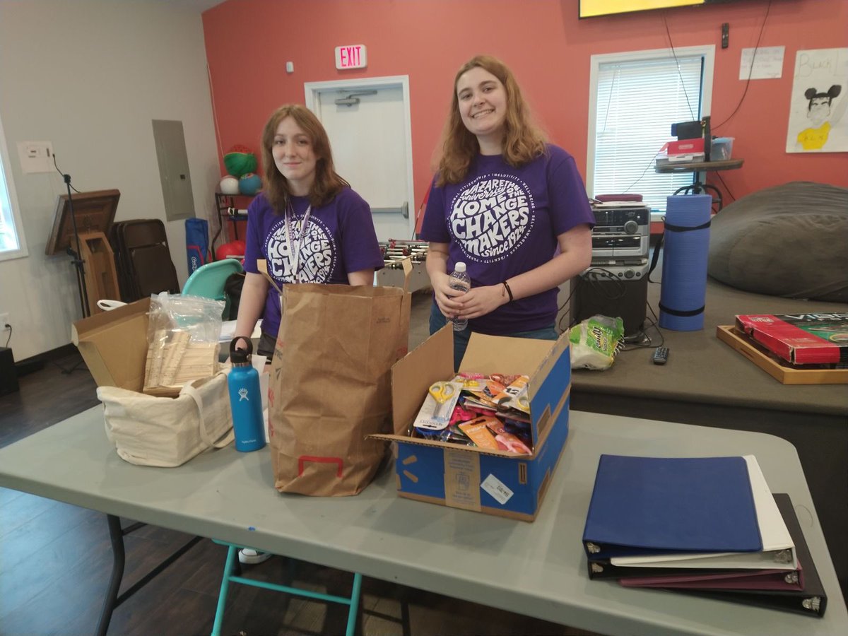 CameronCM48's tweet photo. Nazareth University students showed up in full force today at the Teen Center to stuff backpacks with school supplies!  The large group of students set up the room and put the assembly line in motion!  THANK YOU!  THANK YOU!  THANK YOU! https://t.co/ZlbWPfhE05