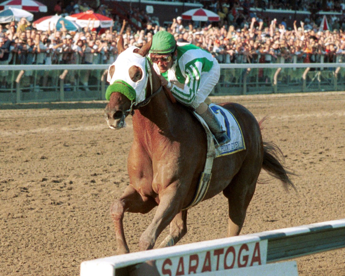 graybrigade's tweet photo. #OnThisDay in 2001, Point Given captured the #TraversStakes before a record crowd of 60,486 at Saratoga, NY. That year, Point Given won the Preakness, Belmont, Haskell, &amp; Travers, becoming the 1st horse to ever win four $1M races in a row. #HorseRacing  
📸: Adam Coglianese https://t.co/EIA2nXOzgK
