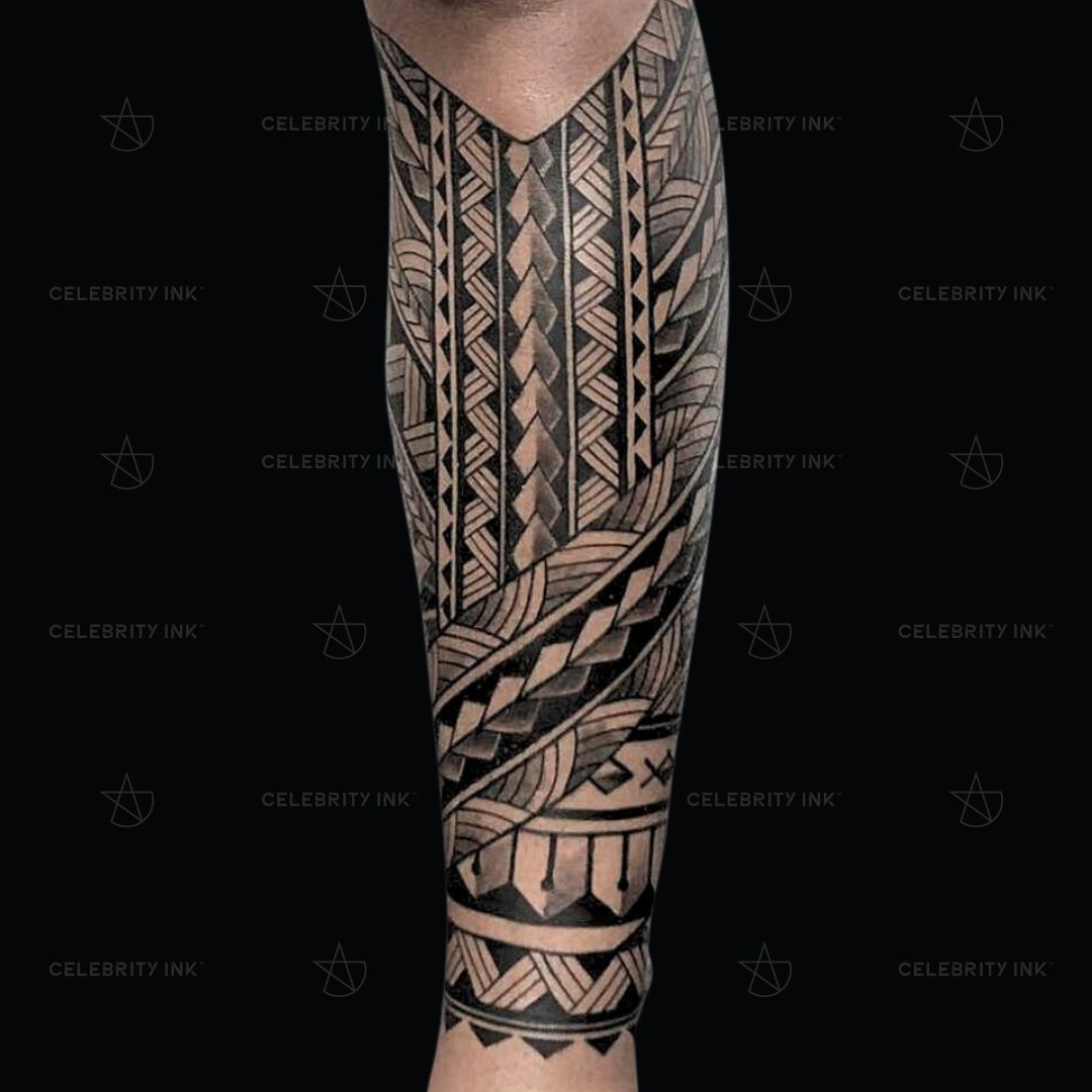 Unveiling the power of ancient symbols through modern artistry. Tribal  tales etched in ink. What stories do you think this tattoo holds? 🌍🖤, image size:1080x1080