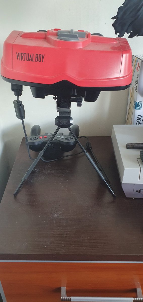 r3trogam3boy's tweet photo. Happy Friday Crew today I share a picture of my #VirtualBoy this one is fully working got the lines in the screen properly fixed by getting them soldered in cost a bit but was well worth it. #VerticalForce #Wario and #Tennis all great games on this underrated console. What were your memories of it?