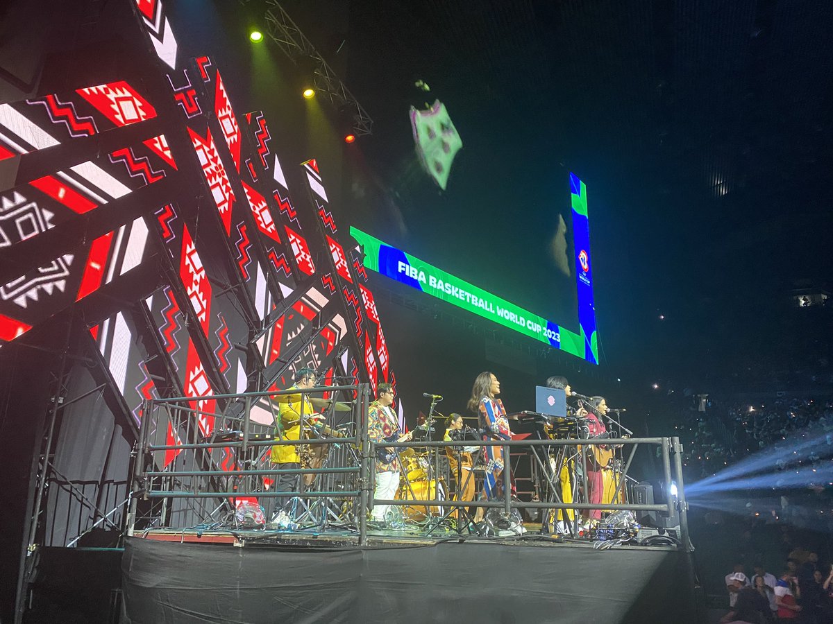 ABSCBNNews's tweet photo. The 2023 FIBA World Cup is formally opening with a tribal themed performance by OPM band Ben&amp;Ben. | via @dggasgo  #FIBAWC https://t.co/DeHk4BckZ2