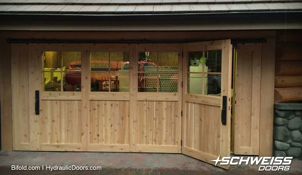 Forget Carriage Doors. Find the Right Matching Look with Schweiss Doors!

#cabin #architecture #archidaily #architect #buildingdesign #hydraulicdoors #designerdoors #securitydoors #schweissdoors