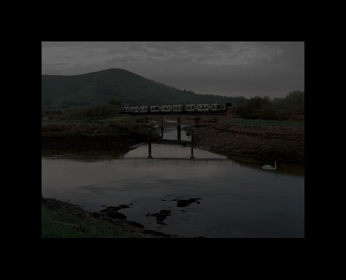 A new image for my project, The Ouse, part of my Downland  Portfolio. The scene shows Mount Caburn, a train from Lewes to Newhaven, and a somewhat ghostly swan. Photographed near where Ravilious stayed at Furlongs as a guest of the artist Peggy Angus. #photo #nightphotography