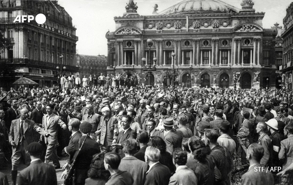 AFPcom's tweet photo. 🗃 #AFPArchives - En commémoration du 79e anniversaire de la #LiberationDeParis durant la Seconde Guerre mondiale, voici quelques archives #AFP pour revivre ce moment marquant, survenu du 19 au 25 août 1944. https://t.co/2xm9aEMByn