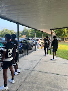 SSPantherFB's tweet photo. #BeElite on and off the field! Our guys were spending their gameday morning helping our future panthers get to class at the elementary school. https://t.co/f93Gi0UX7s