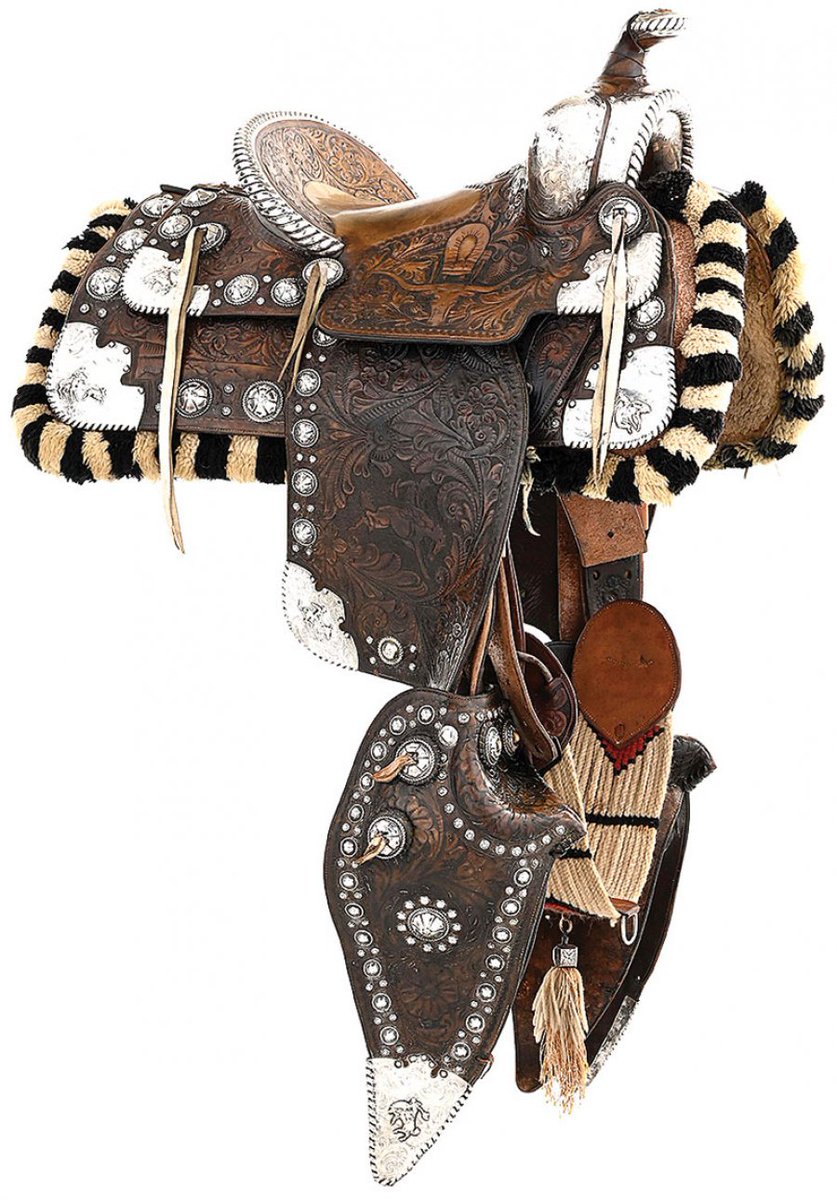 AntiqueDigest's tweet photo. 1930s Edward H. Bohlin sterling silver parade saddle with leather & silver carving and silver conchas brought $50,820 (est. $30,000/40,000) at Brian Lebel’s Cody Old West Show & Auction, in association with Morphy Auctions (6/24/23) #antiques #antique #saddle #Bohlin #horse https://t.co/syYNPYesKo