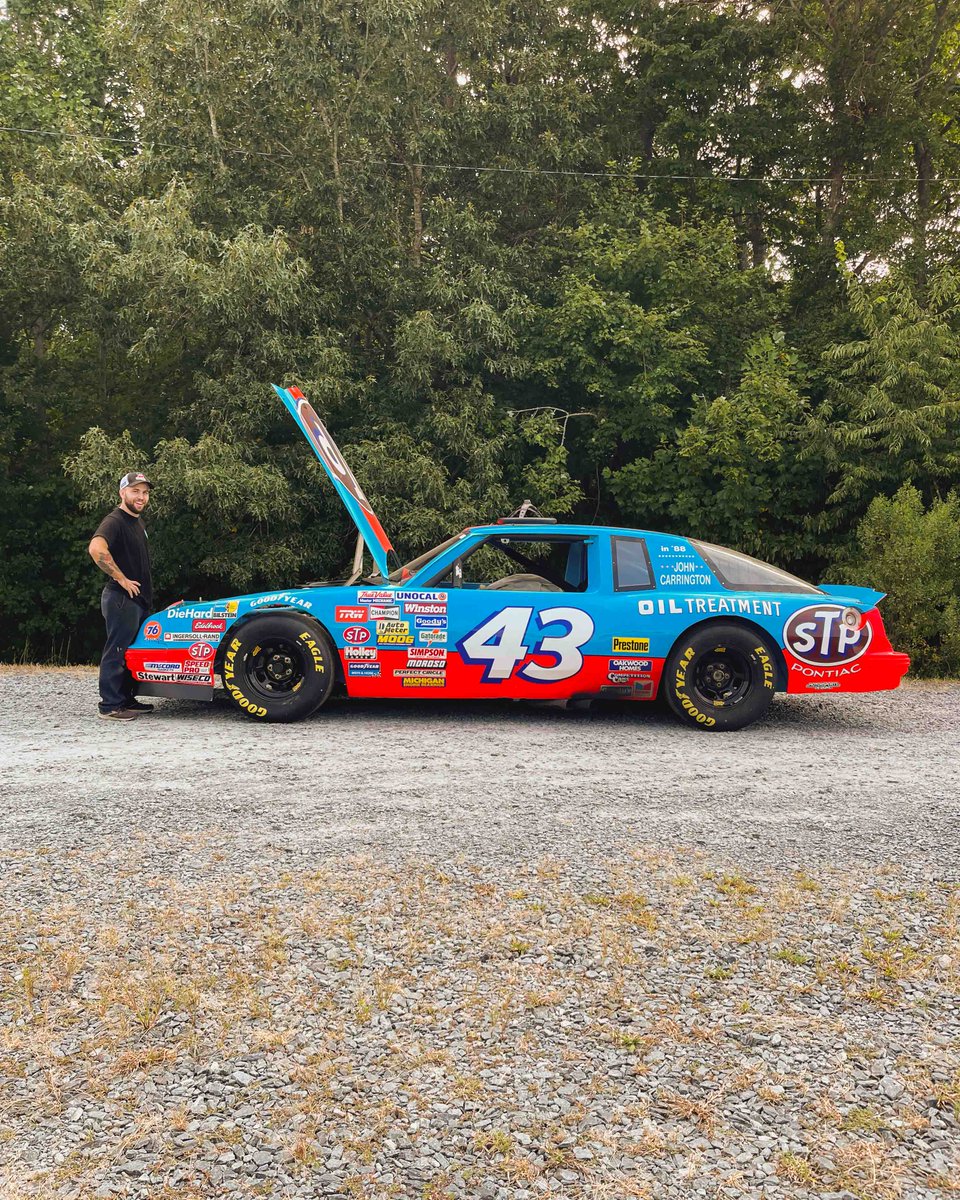 The face says it all! Who doesn't love race cars?! This classic is back from Goodwood! You can see it on display at the @pettymuseum.