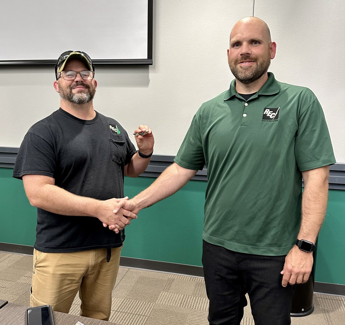 Congratulations to Chad Ruden, member service lead staking technician, on receiving his Federal Aviation Administration drone license! 

Presenting his “wings” to Chad is Member Service Supervisor, Aaron Healy.