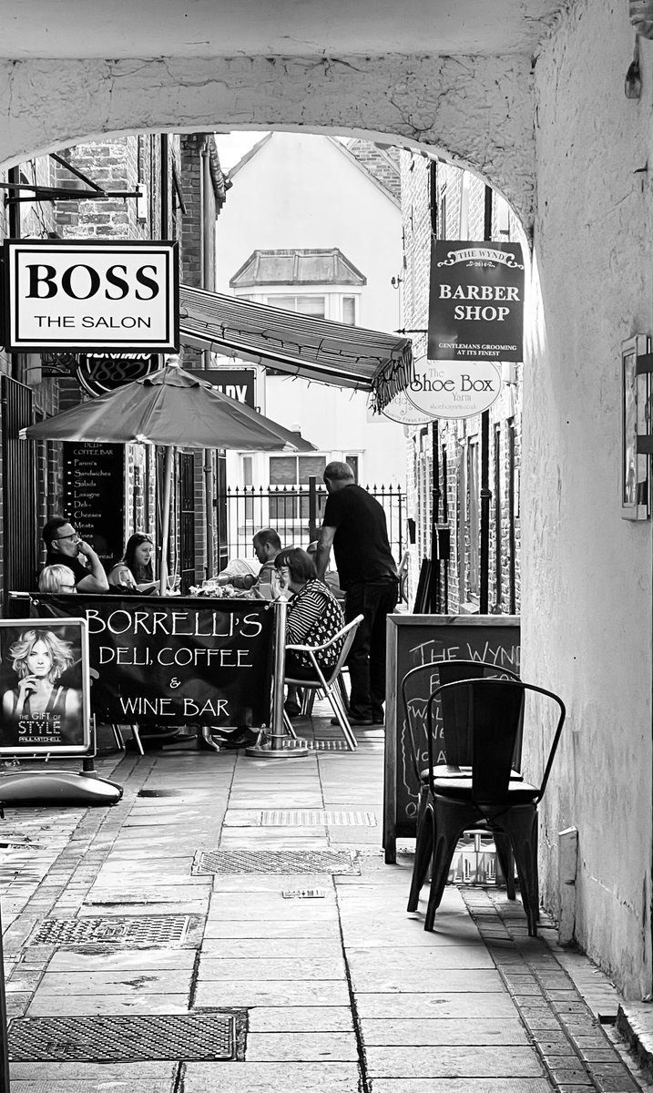 IanGee19's tweet photo. A very pleasant long lunch at #Uno in #Yarm to dodge a downpour, followed by a stroll up the High Street and a stop at #Borrellis to pick up some cannoli. ⁦@ThePhotoHour⁩ #streetphotography #blackandwhitephotography https://t.co/yFtdwHWuXh