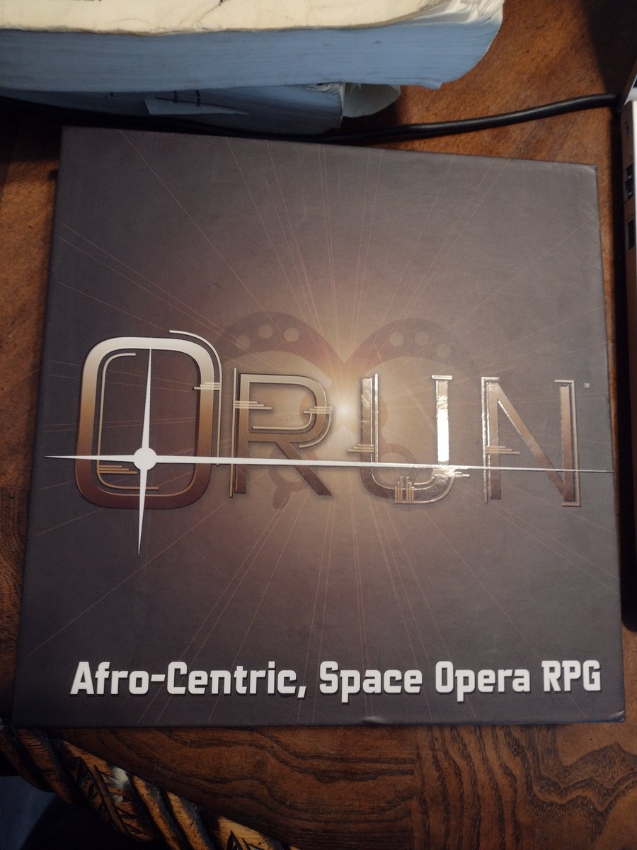 jwsgt's tweet photo. #RPGaDay #RPGaDay2023 day 25 I have many unplayed #TTRPGs  I REALLY want to play Is #Orun  fm @NewAgendaPubs its a #blerd space-opera rpg great concepts &amp; well put together hardback with great  art &amp; narrative focus. my #herosystem uni is very #blerd focused so it had me at 🖖 https://t.co/t42oHbPmto