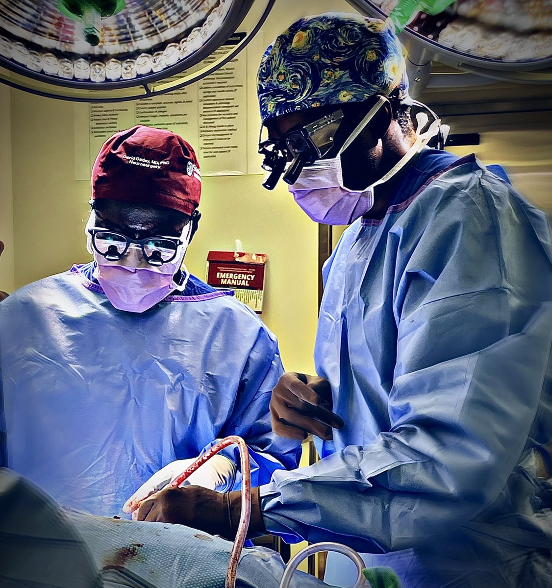 More BTS with @DYDadey in the OR: 'One of the best parts of chief residency is teaching my juniors as we take on difficult and complex cases. Here I am (on the left), taking PGY-3 Dr. Bina Kakusa through a far-lateral approach for a cervico-medullary tumor.' #SUresidentTakeover