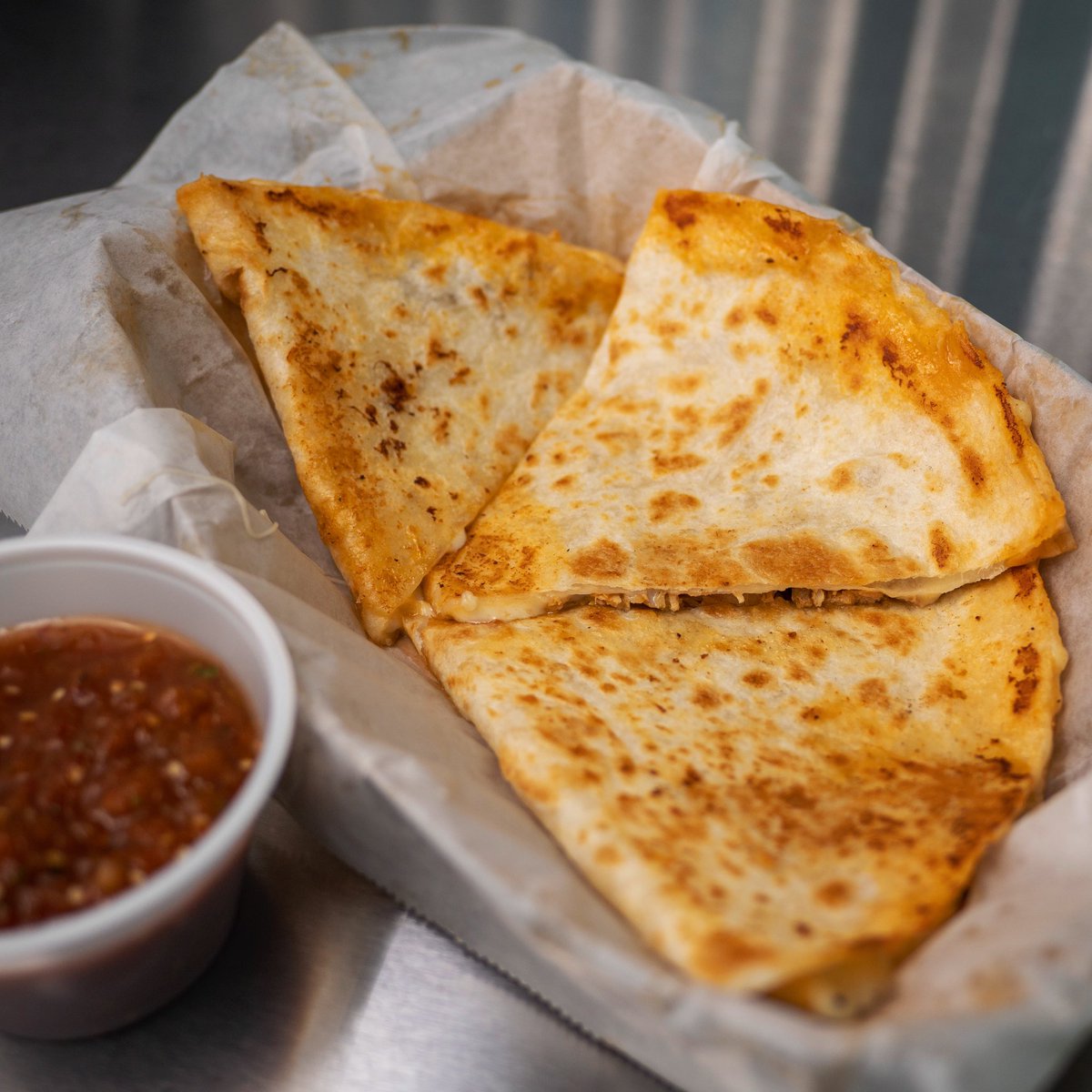 It’s not easy being this cheesy! Swing in for a delicious melty quesadilla paired with your favorite salsa. 🧀

💻: DetroitTaco.com