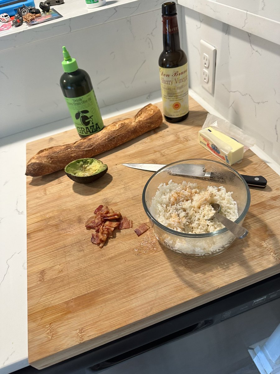 Popcorn rice and butter, sourdough baguette, avocado and bacon. Breakfast got strange the other day.