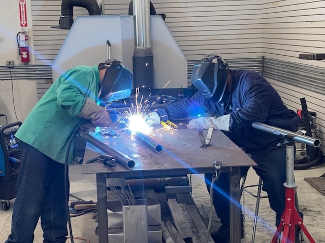 IowaWesternBCE's tweet photo. IWCC celebrated the conclusion of it's Open Welding MIG class. The participants worked on the new sign for our Business &amp; Community Training Center, where the classes are held. Check out how you can get involved below! https://t.co/eshTJi26CZ