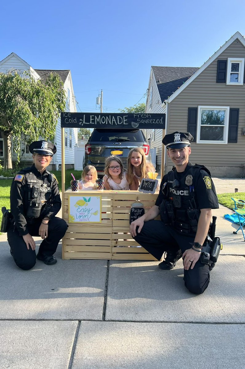 TTPD's tweet photo. Two of Tonawanda’s finest just hit the jackpot while patrolling on a busy Friday.  Perfect evening for some lemonade! https://t.co/3ezbNHkfop