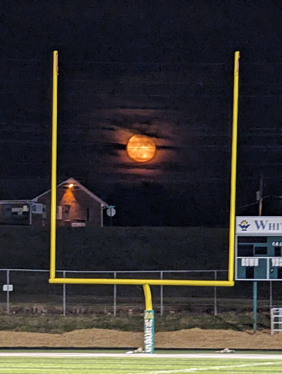 sheal_t's tweet photo. Two absolutely beautiful pictures. Our varsity boys played hard and it showed. Now to get some sleep to get up and do it again tomorrow morning for JV. The moon made it perfect. #FullMoon #FridayNightLights #FridayNightFootball #WaningGibbousMoon #FootballAuntie https://t.co/L3k5rrzftg