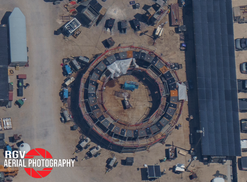 CSI_Starbase's tweet photo. SUPER HEAVY SPECULATION ALERT:

Those of you who watch the Starbase Weekly livestreams will have heard parts of this theory already. 

I am now 95% confident that SpaceX is in the process of building not one, but two Super Heavy Static Fire Test stands. One will be located near the Subortibal tank farm, and the other will be at the Massey's test site.

These test stands are essentially mini versions of the Orbital Launch Mount. There are a few major differences though: 

1. These stands will not have launch capability so they will be much simpler. No retracting hold down clamps, but they will have 20 Raptor Quick Disconnects for starting the outer 20 engines. These QD's will likely not need to retract into the table, but they MIGHT do so in order to prevent them from being damaged as the booster is lowered in. Keeping the booster stable is a lot more difficult when using a crane for this job.

2. Because of the location of these test stands, and severe limitations on space, the method of testing engines will have to be different than how its done on the OLM. Im other words, SpaceX will not want flames shooting out in 360 degree and will instead direct the exhaust plume to one side.  

With that said I believe its highly probable that both of these test stands will have flame trenches under them. Its really the only way to make this work. This will inevitable cause people to start suggesting that they have had a change of heart and that they have realized that a flame trench was the right way to go all along but in my opinion this is not the conclusion we should come to when we see it. 

So now there is the question of WHY. Why would SpaceX need test stands just for Static Fire testing?

1. Well at some point, launches will become much more frequent. This means the OLM will be nearly always be busy preparing for the next launch. As the launch cadence inevitably increases, there will be a backlog of boosters waiting to perform pre-flight engine testing. This will prevent that from becoming a problem.

2. The Orbital Launch Mount, with its new Bidet system is limited to Static fire tests of less than 10 seconds. It is truly designed for Launching Full stacks, and not for long duration tests purely due to the volume of water stored in the tanks.

3. The OLM is also believed to be limited to Static Fire tests with thrust values at or around 50%. This is a result of the design of the hold down clamps. Also, the skirt of the booster is likely not designed for the kind of forces it would experience if it was being held down at max thrust. There is no evidence of this currently, but its possible there may be some additional hold down capability with this test stand. This would likely involve placing a cap on top of the booster and strapping it down to the test stand. As I said, something like this would only be necessary if they want to perform SF tests at higher thrust levels.

So if this speculation is true, what should we be on the lookout for?

1. The areas where these will be located will either be built up to accommodate a flame trench, or they will soon begin excavating large holes into the ground for this purpose.

2. The suborbital tank farm will likely need to be expanded in order to increase its LOX and CH4 storage capabilities. I believe SpaceX is already in the beginning stages of this massive renovation.

3. CH4 storage tanks will need to be added to the Massey's test site. They will also need additional GSE equipment for filling Booster COPV's. This includes Helium storage, CO2 for the engine skirt purge system.

4. There will likely also need to be additional water tanks installed for traditional deluge systems for both of these tests stands. If they plan to do longer duration tests than what is allowed on the OLM, than these will be rather large storage tanks. Expecting they would be elevated water towers but we will have to wait and see. 

Anyways, thats all for now. I usually don't like to post things like this on X anymore because something like this will get turned into a script on someone else's YT channel without mentioning the original source. But at the moment, I currently don't have time to make a video on this topic. 

I am in the middle of two other deep dive investigations so this one will have to wait until things have developed further. We will discuss this more tomorrow during the RGV Starbase Weekly Live Stream!

Thanks for reading! Feel free to add additional thoughts in the replies below.