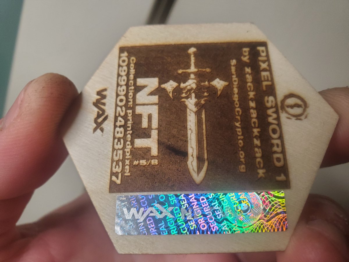 ackza619's tweet photo. 1 wax backed #printedpixel pixel sword nft (key on back) $WAX https://t.co/rLAkNzeZGM