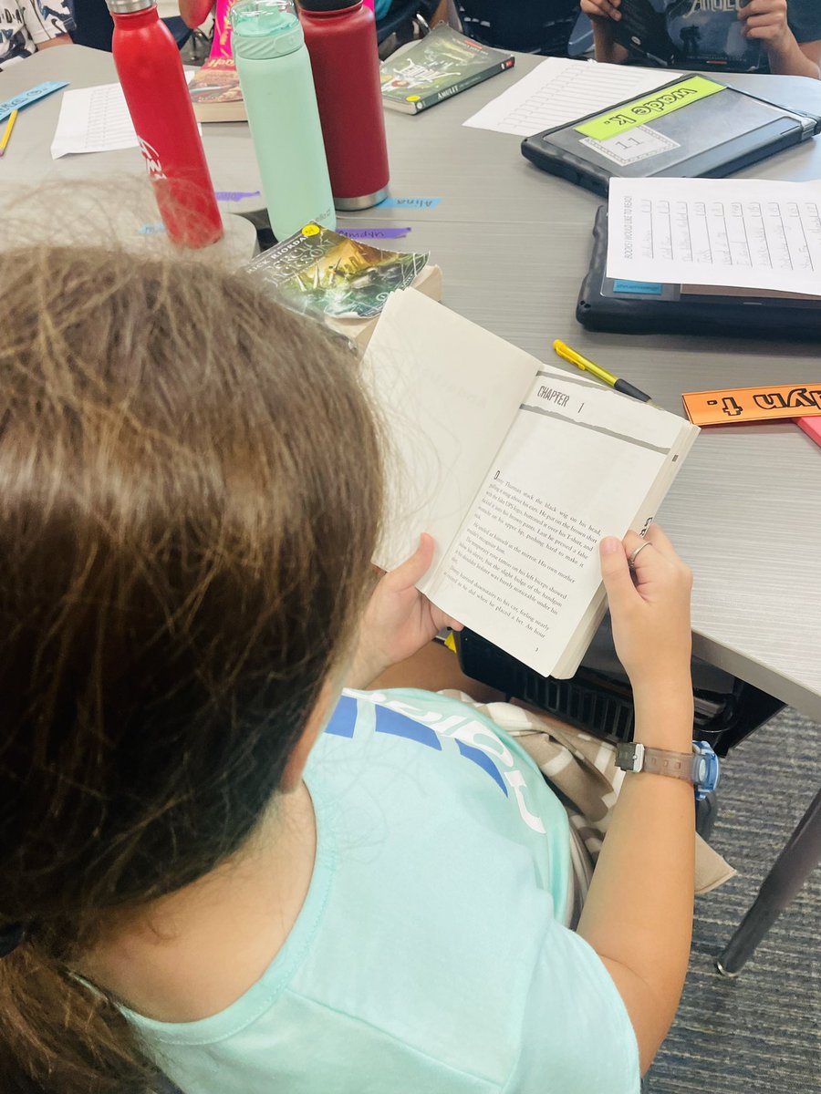 amycgraham13's tweet photo. My favorite day of the year - Classroom Library Opening Day! I wore my favorite library earrings, read my favorite "book" book, and when I ripped the caution tape off of my bookshelves, the kids all cheered! 🥹🥹🥹 My heart is full today. #HallHawkReaders #ccisdmoments https://t.co/bXfXPZt6q7