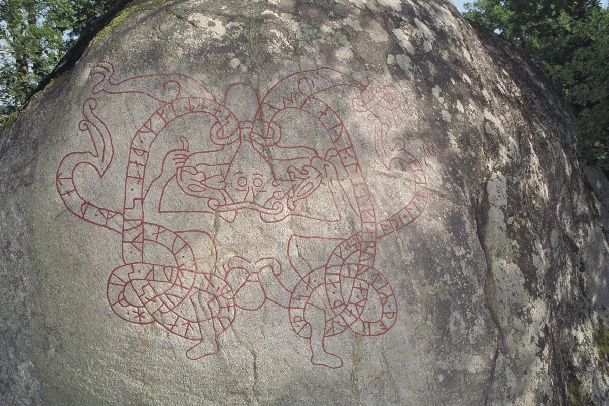 The Gislestenen is a unique runestone in Södermanland, Sweden, dating to the 11th Century. The figure could depict Ragnar Loðbrók in the snake pit, or perhaps Thor fighting serpents.