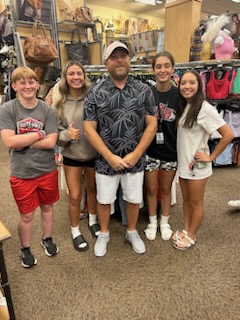 Coach Nic has a wedding to go to tommorow. Took the girls to pick out my outfit. 4 teams chose outfits. Still deciding between 2. Black pants outfit or Hawaiian looking shirt? What's your vote?