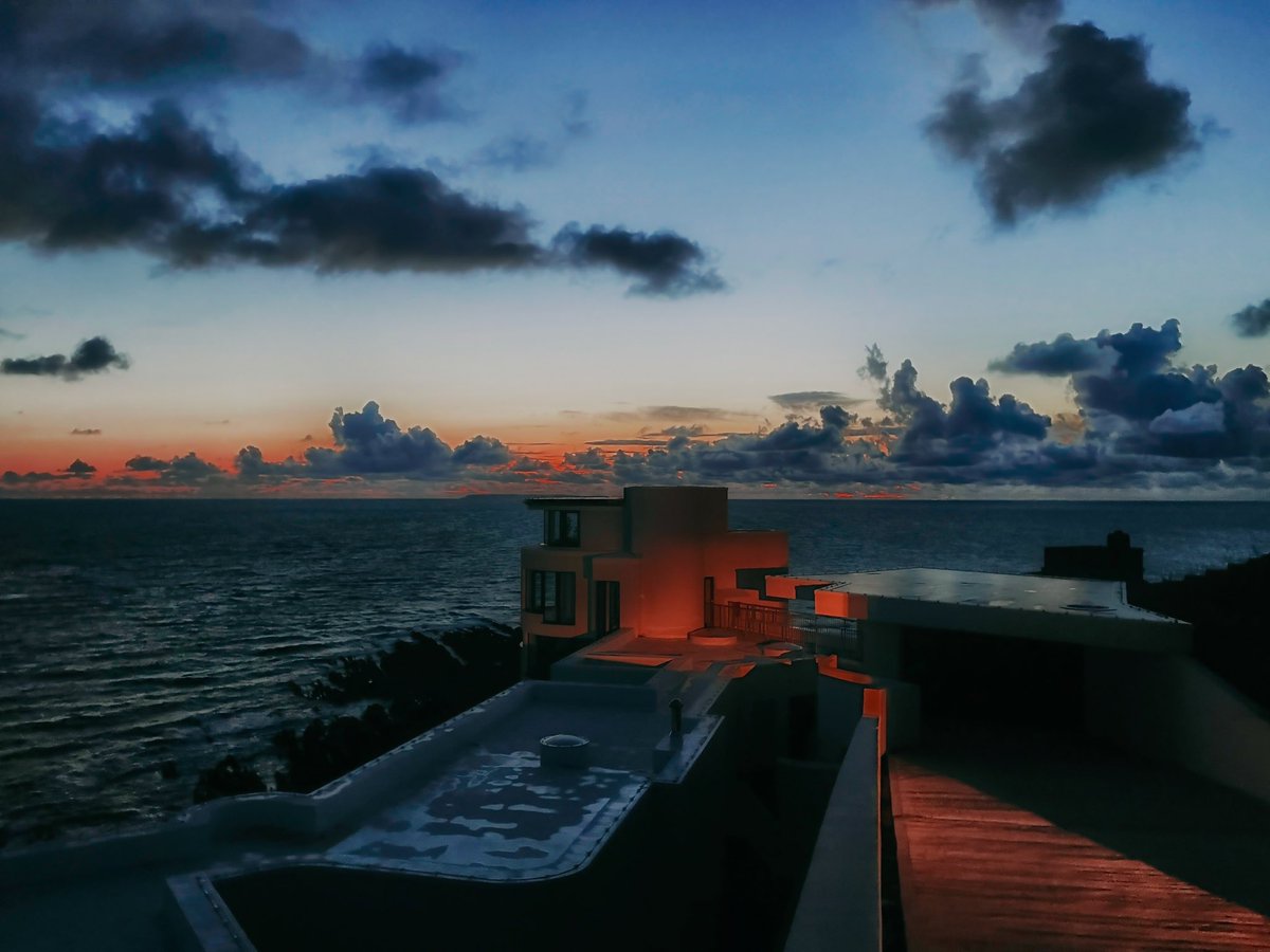 thisdevon's tweet image. I love this house , I know it divides opinion but I stopped to admire the fading sunset and the vista , my headlights lighting up the front of the house with the moody darkness after a stormy day #devon #this_devon #croyde #downend #chiselcliff