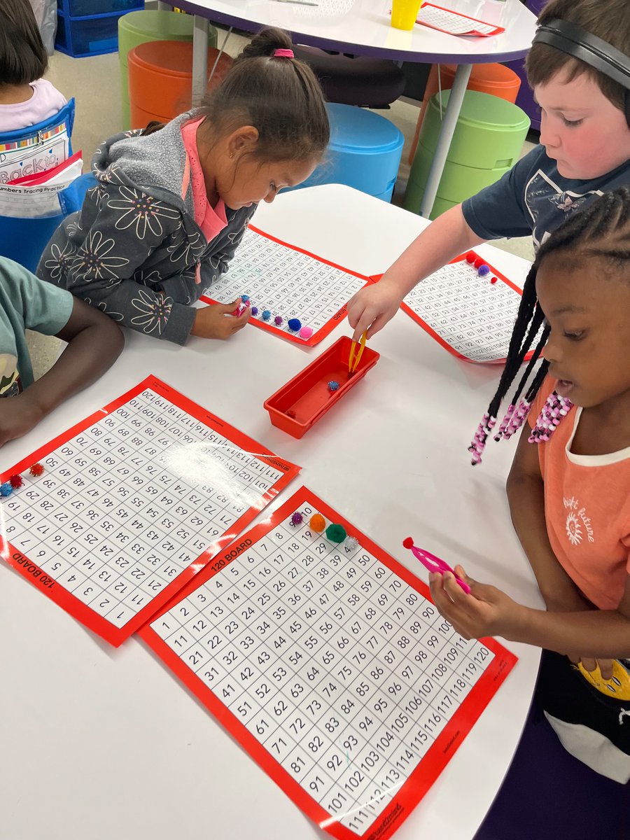 LJackson1st's tweet photo. Today we practice skip counting by 10s from any given number by picking up our magic poms with tweezers and placing them on our 120 chart! #WeloveMath https://t.co/EW83huCtod