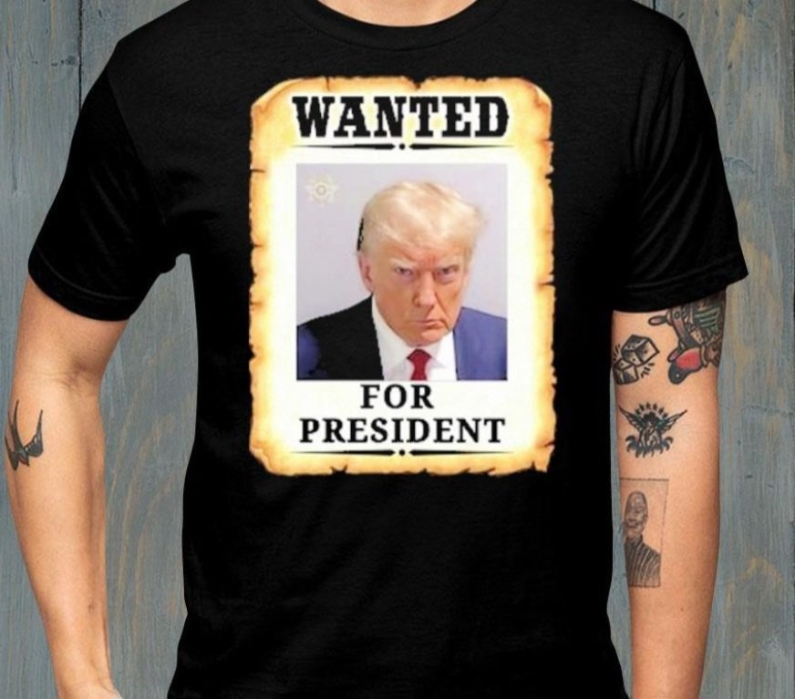 BeccaBooj316's tweet photo. @CNN I guess ya did see that coming! How much do you think he'll make off this merch? https://t.co/D6FdAABKj3