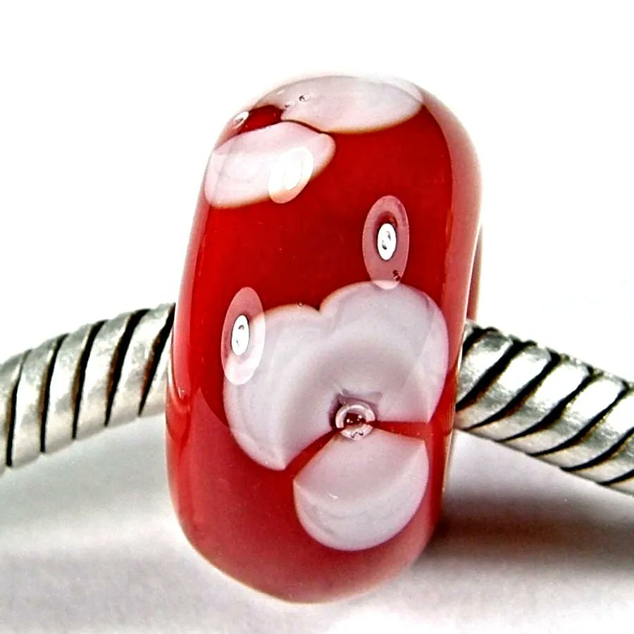 Ready to wear red handmade large hole lampwork glass bead with white flowers and trapped air bubble centers bit.ly/RedWhiteFlower… via @Covergirlbeads #sdftt #FlowerBeads #LargeHoleBeads