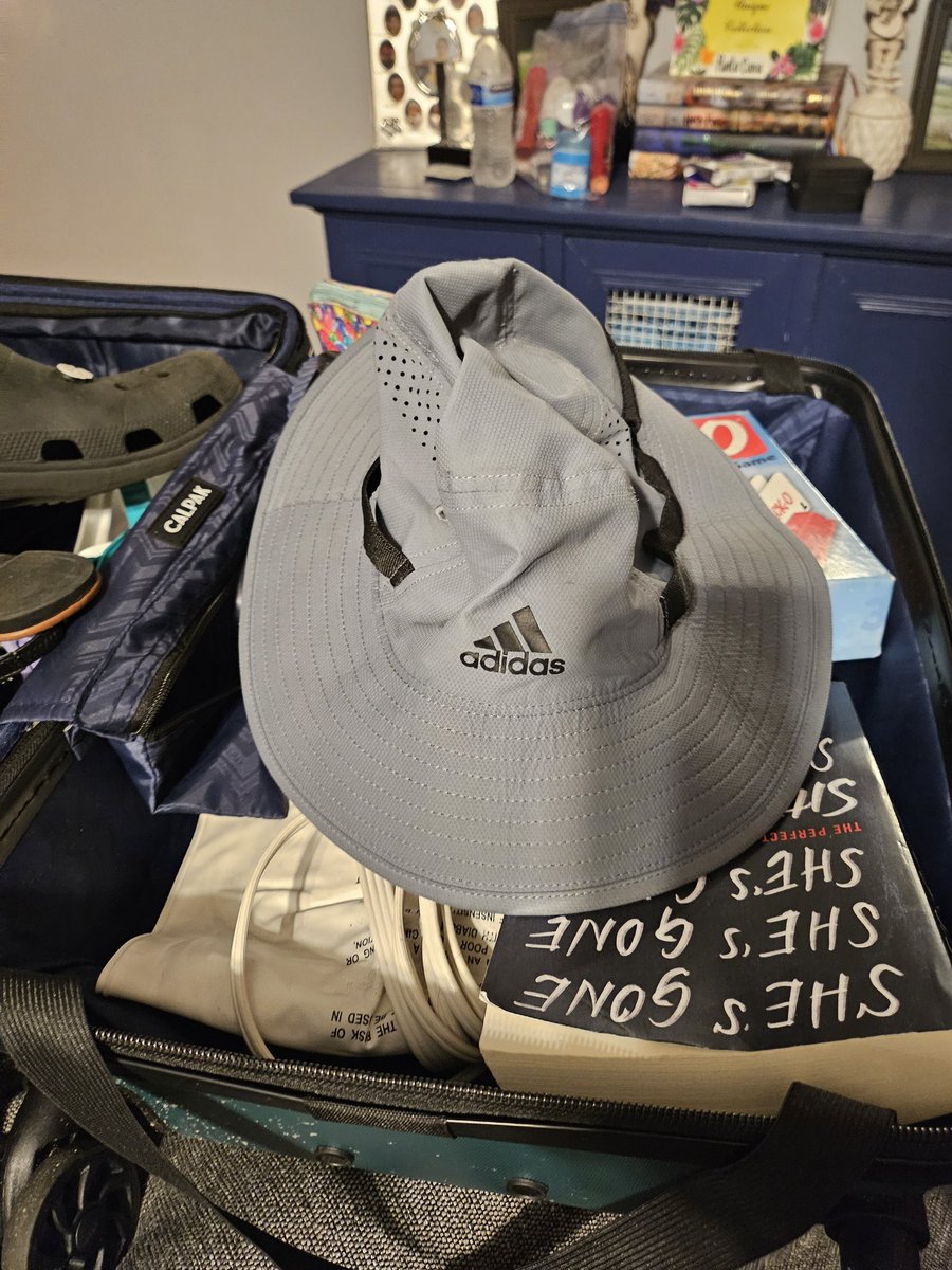 JoVee_24's tweet photo. Hey @AmericanAir, I left vacation with a Black Adidas bucket hat in my carry on, then was forced to check my carry on in PUJ because of no space, and when I finally get home and unpack my case, I have a Grey Adidas bucket hat, that I've never seen before in my life that smells. https://t.co/u6GGye2wOg