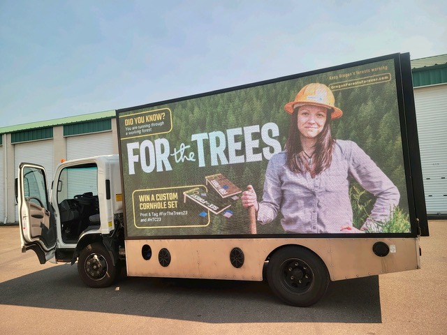 Running #hoodtocoast? Look for our billboard at exchange #35 -  meet the forester on this billboard and enter to win a set of custom cornhole boards! #htc2023 #HTC #forthetrees23