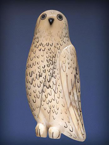 An Inuit Owl Pendant. Medium: Carved ivory, baleen, black pigment. Collected on Herschel Island, Inuvialuit region, c. 1903-1905. Credit: Canadian Museum of History.