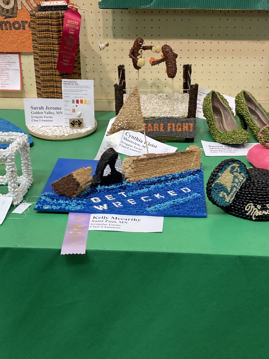 periwinklejane's tweet photo. I saw the most @JortsTheCat crop art at the Minnesota State Fair. It’s amazing. https://t.co/xnBiVQ5FFz