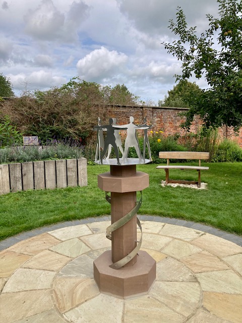 Visited lovely #LydiardPark yesterday and saw one of the #swindogs looking fabulous glittering in the sunshine in the walled garden! Also the very beautiful COVID memorial sculpture. #Swindon @LydiardFriends