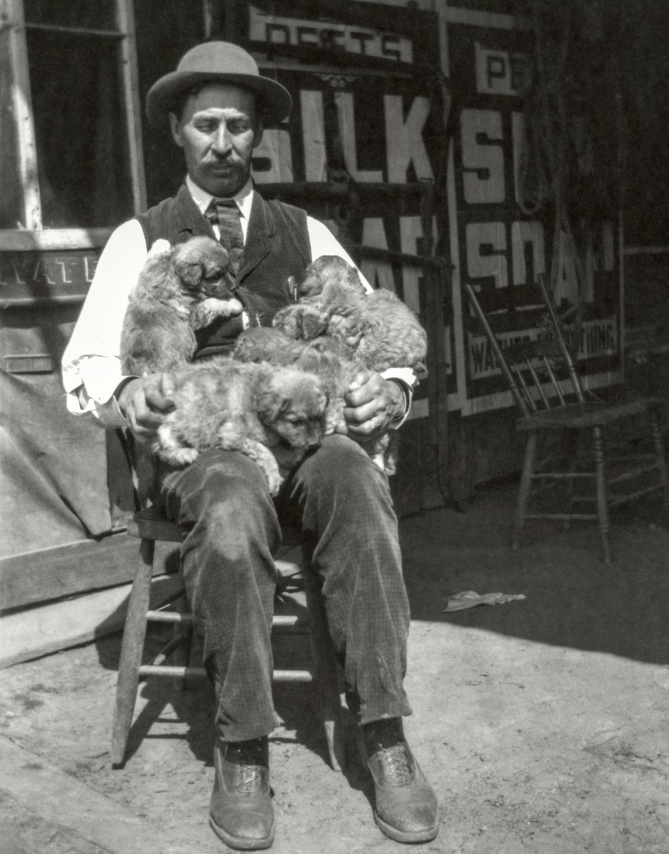okhistory's tweet photo. “I love a dog. He does nothing for political reasons.” –Will Rogers  

Photo of an unidentified man with puppies on his lap in Muskogee, Indian Territory, 1901 
(Heye Foundation Collection, OHS) #DogDay #NationalDogDay https://t.co/JQaPTUOJfF