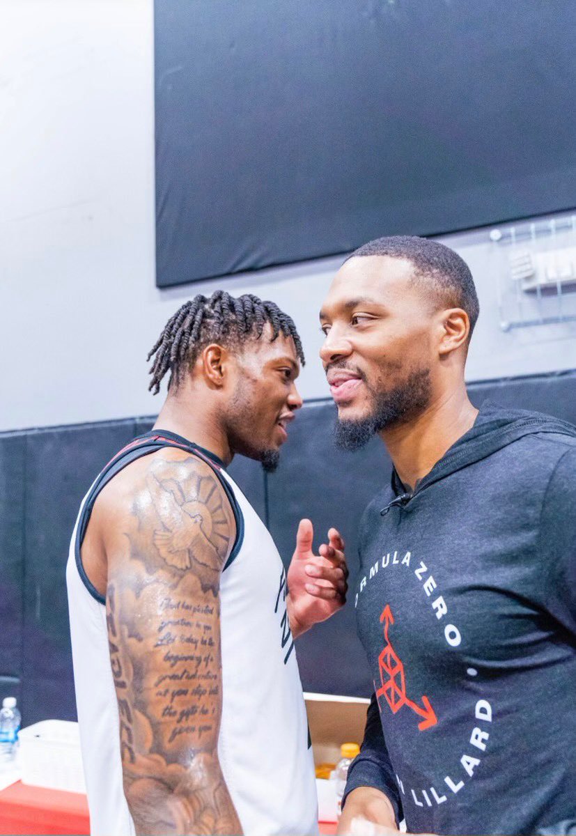 FAUMBB's tweet photo. Dame + South Florida 🧐

Congrats to our guy @martin_alijah for winning MVP of the Damian Lillard Camp 🏆 https://t.co/RX7SB5KQXa