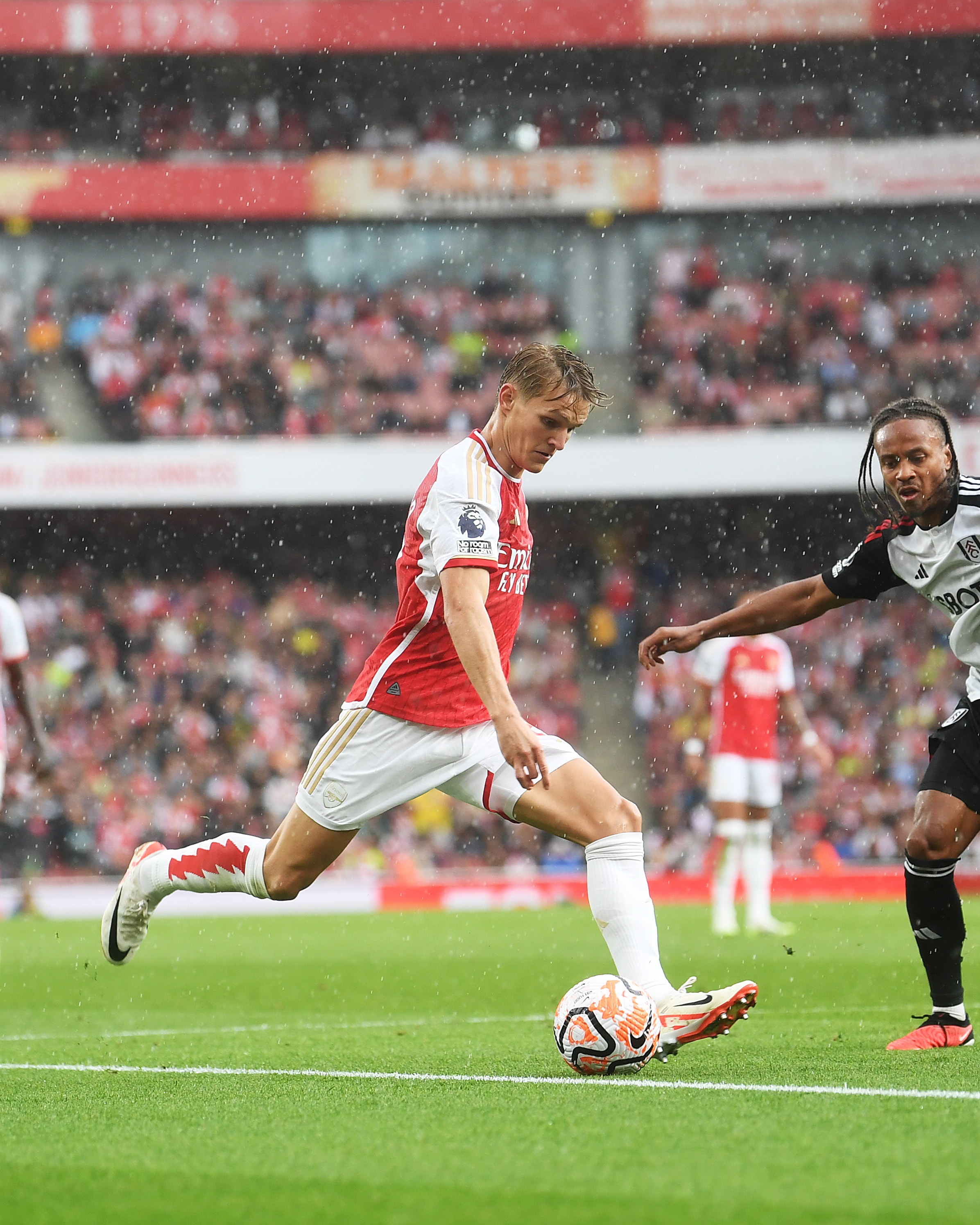 Martin Odegaard in action against Fulham