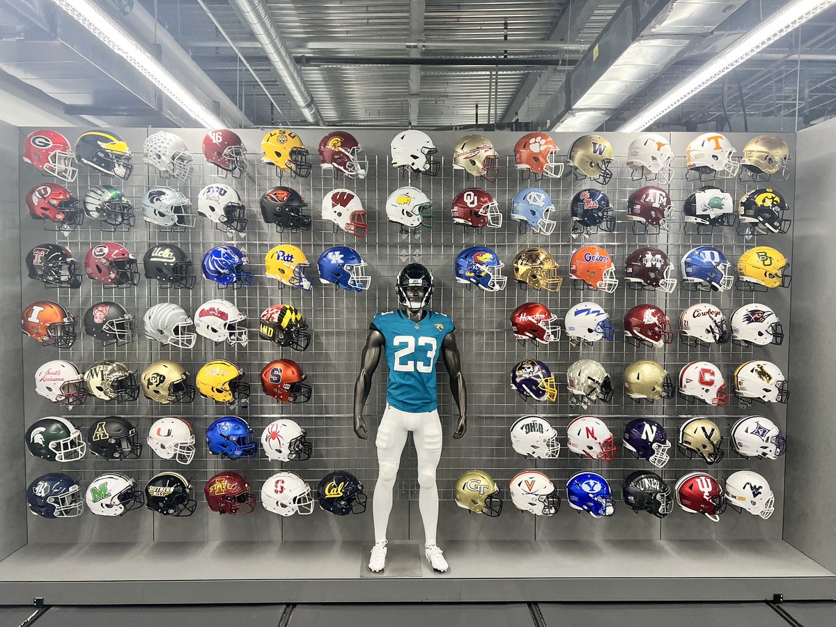 JagsEquip's tweet photo. Teal/White/White for tonight and the debut of college football. AP top 25 (minus @GreenWaveFB) and some of our other favorites sent to us from around the country fill up our new helmet wall. https://t.co/7cakNvPGB2