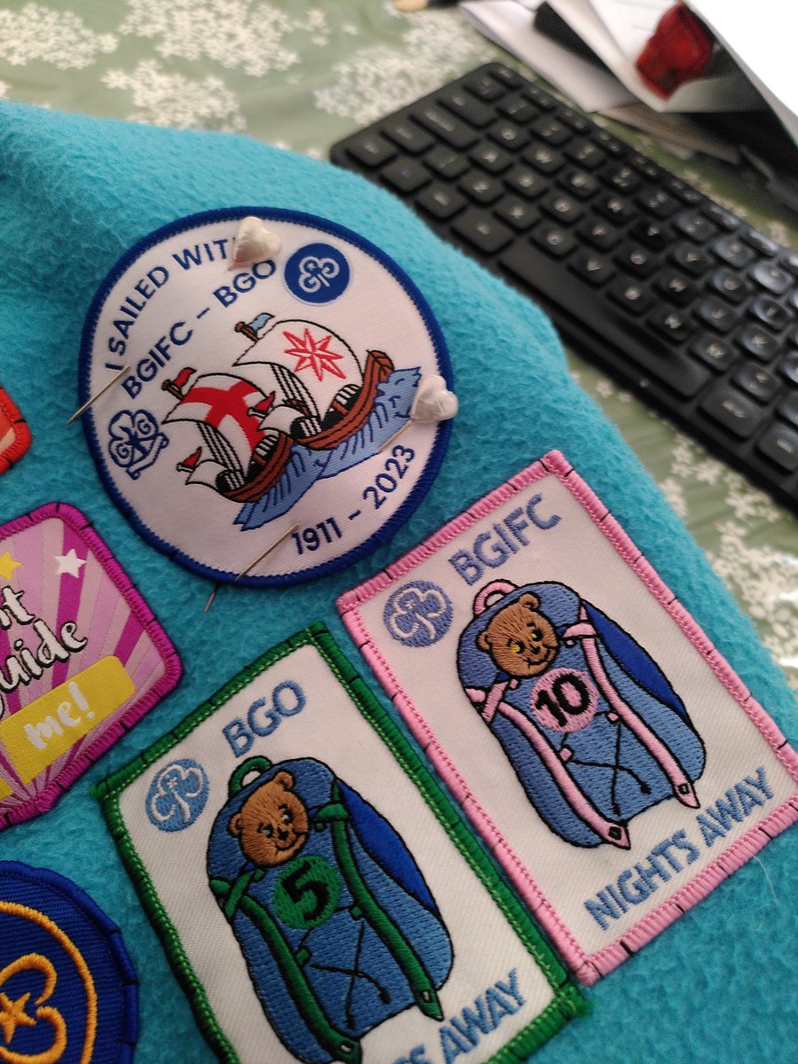 Sewing on my #SailingWithBGO badge during our Sail Away Celebration. Holding back tears as I run the zoom webinar. <a href="/girlguidingbgo/">British Girlguiding Overseas</a>
