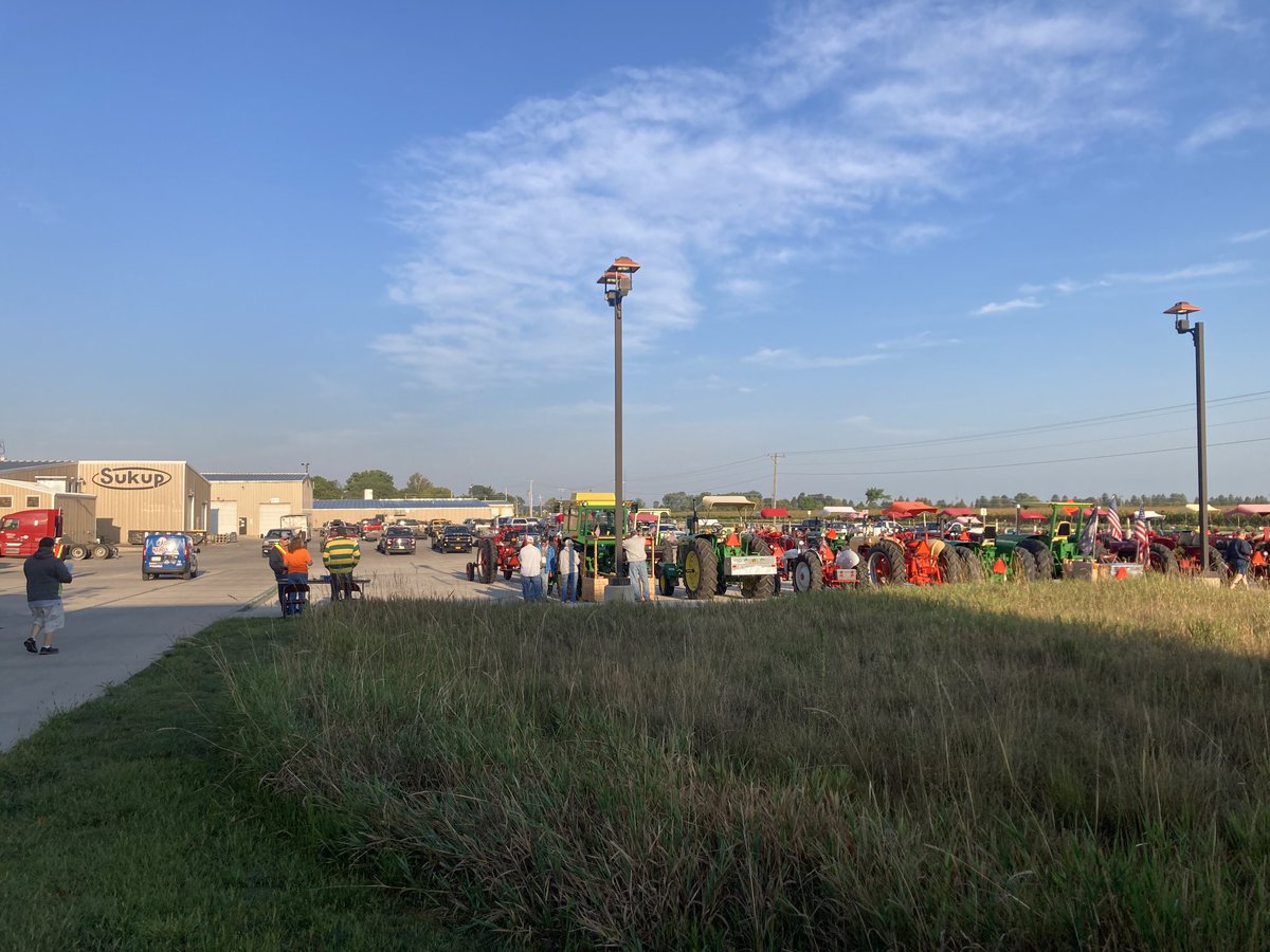 Farmers gathering ⁦<a href="/SukupMfg/">Sukup Manufacturing Co.</a>⁩ for the #KLMJ Tractor Ride. Beautiful morning. 60 antique tractors traveling 60 miles in Franklin County on our company’s 60th anniversary!
