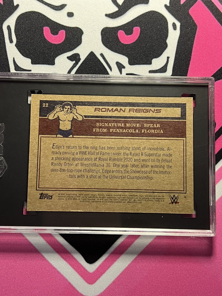 cardfoundpod's tweet photo. #SaturdaySlabs featuring Topps! During the Living Set run a few of these trickled out into collectors hands. This Roman Reigns card features the bio back of Edge! Who was able to secure these before Topps corrected the card? https://t.co/2uMUza1iS4