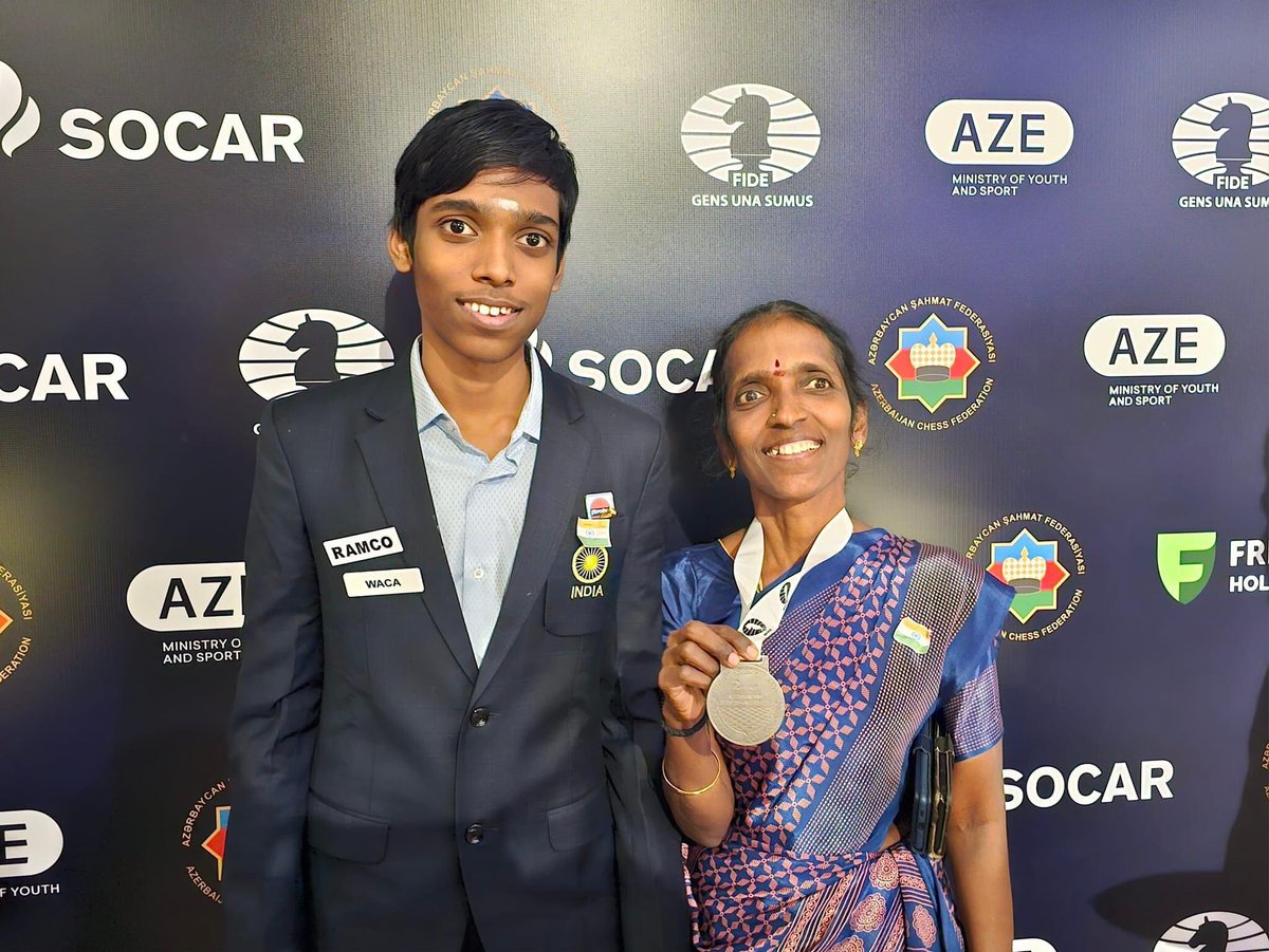 IAMDirRAM's tweet photo. A Mother's Pride: Praggnanandhaa R.'s mom dons his Runner-Up medal from the FIDE World Cup 2023, Baku, with smiles that foresee many more victories 🙏 #MaaTujhheSalaam ❤️
@ChessbaseIndia #FIDE #FIDEW #FIDEWorldCup #FIDEWorldCup2023 #Chess #FIDEWorldCupFinal
#Praggnanandhaa #inspiring