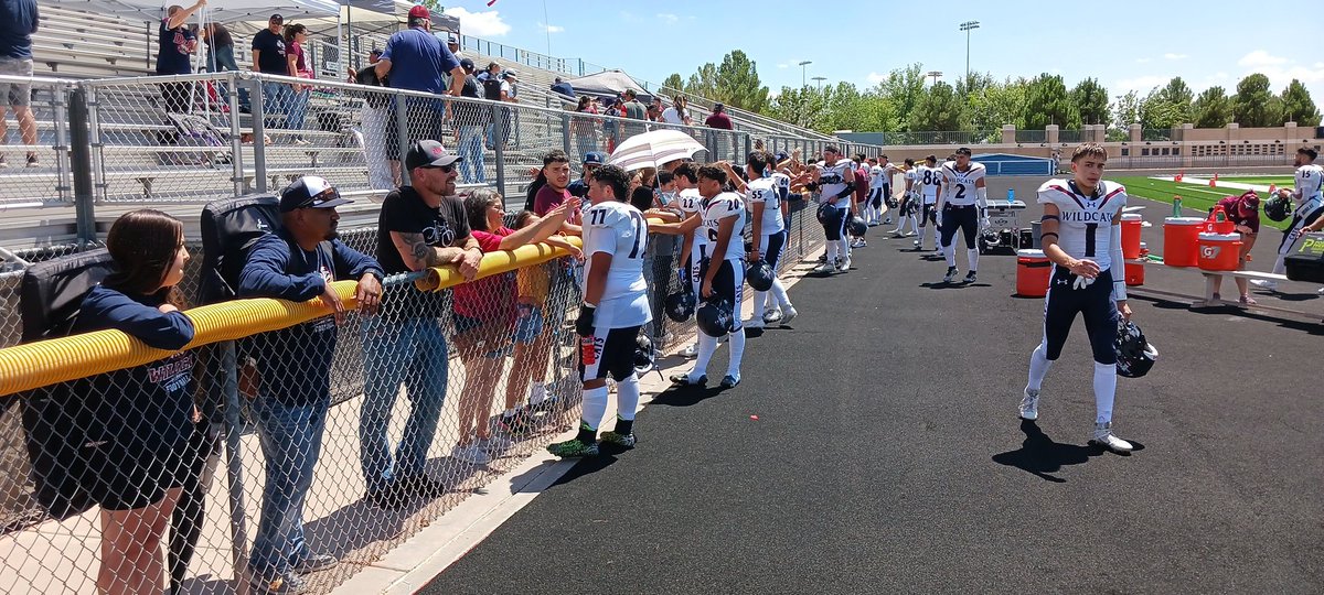 PrepRedzoneNM's tweet photo. Deming players celebrate their victory over Organ Mtn. with the Wildcat fans. https://t.co/IlQNskUh0r