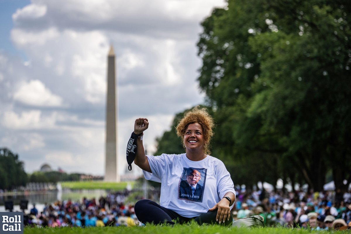 Deborah Busacco of New York City, watches speakers at the Lincoln Memorial during the 60th anniversary of the march on Washington on Saturday, August 26, 2023.