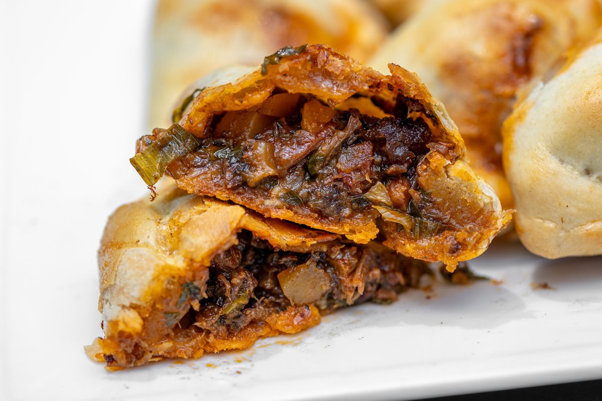 The only thing that can make these smoked beef empanadas any better is eating them with a plentiful amount of chimichurri: bit.ly/45F9YvO