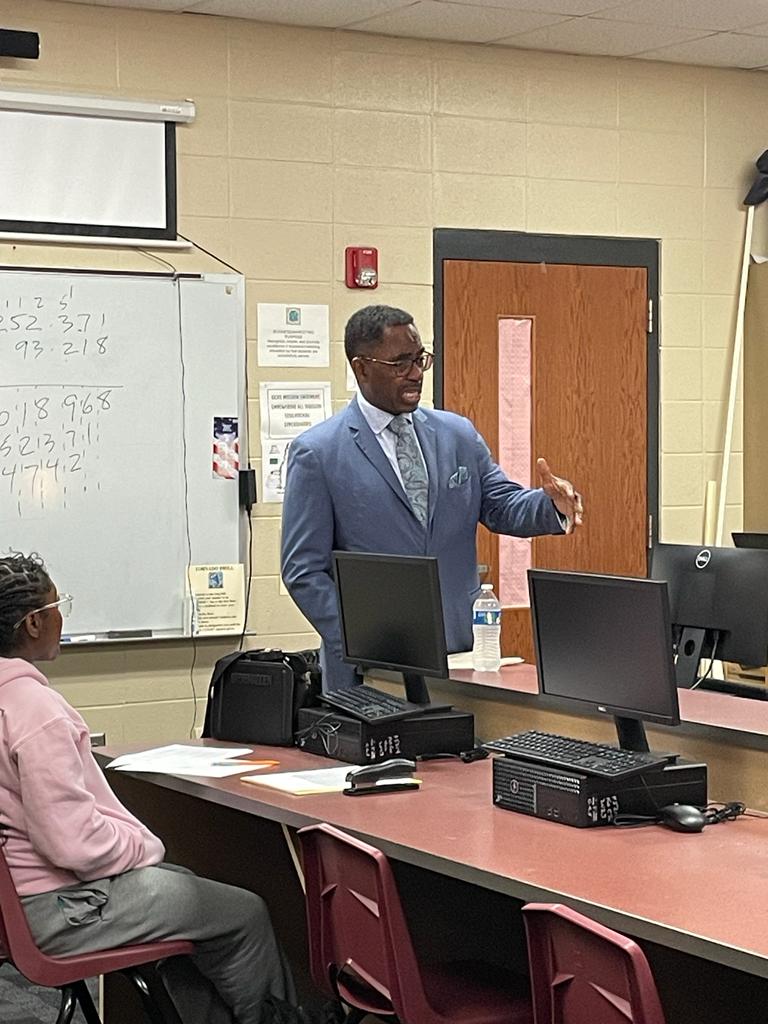TonyReddickX's tweet photo. Superintendent Reddick teaches a Consumer Math class one week before retirement.📚📝 https://t.co/nOE30vSWhA